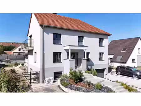maison familiale d'environ 140 m² avec espaces supplémentaires aménagés