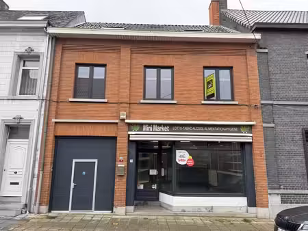 bâtiment mixte (commerce et appartement )