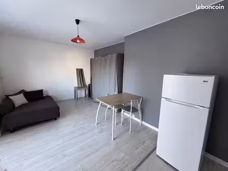 vends appartement +place de parking +balcon