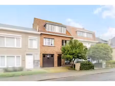 gezinswoning met 7 slaapkamers en garage