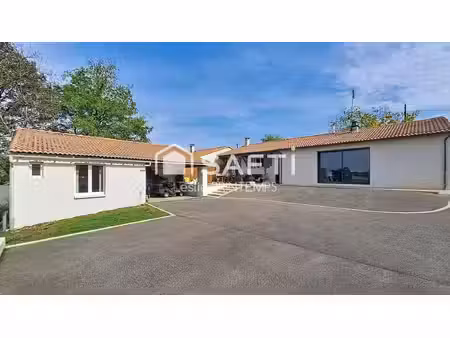 plain-pied avec espace professionnel indépendant
