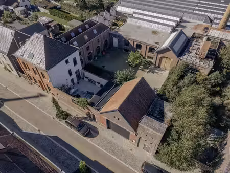 entrepôt (env. 675 m²) avec maison (258 m²) à vendre à ruien