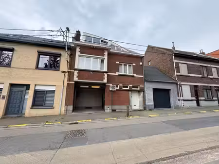 maison 2 façades avec garage à asse (48 caractères)