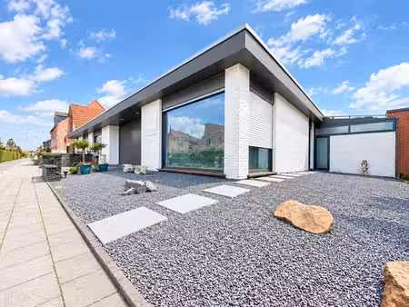 alleenstaande woning met garage en carport
