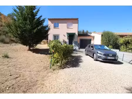 a vendre maison avec garage et jardin