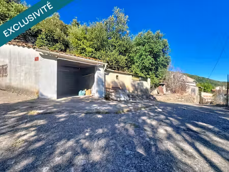 une maison de village à fort potentiel  avec terrain en terrasses  vue dégagée et grand ga