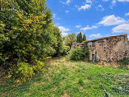 busséol  grange à rénover ou maison à construire sur terrain de 913m2