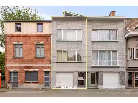 ruime woning met 2 slaapkamers  garage  twee terrassen en tuin