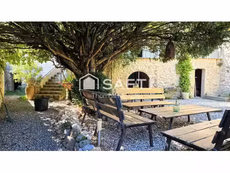 maison de village avec jardin + garage + 4 caves