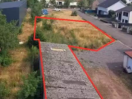 terrain de 450 m² avec hangar attenant de 128 m²  à carling (57490)  à deux pas de la fron