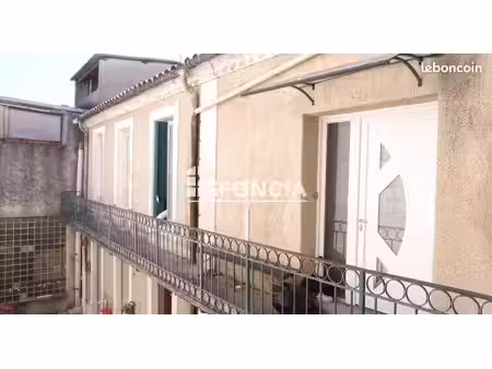 lunel : immeuble de rapport avec 4 appartements et parkings  idéal investisseur