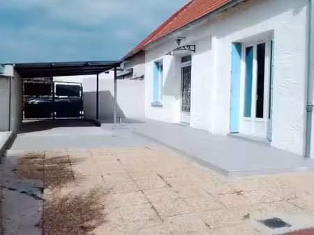 maison 97m2. 3 chambres. grande cour et garage