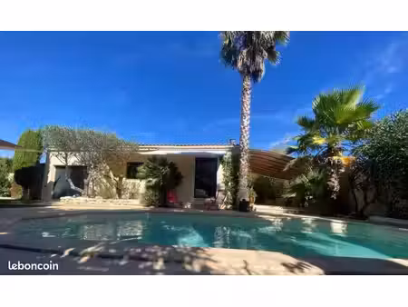 villa de plain-pied – 3 chambres – piscine chauffée – dpe a – 3 stationnements – atelier 1