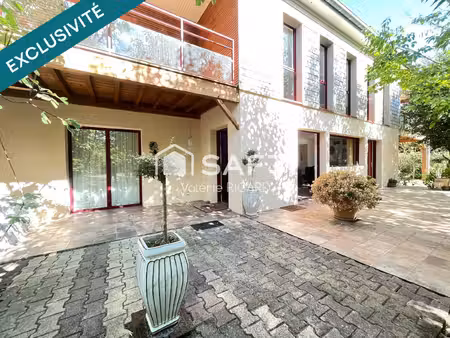 maison avec jardin  volumes et ambiance chaleureuse
