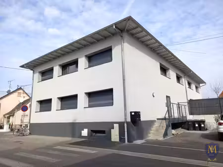 village-neuf centre immeuble de 194 m2 spécial investissemen