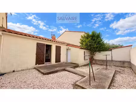 maison de plain-pied avec jardin et garage