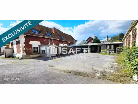 immeuble 430 m2 comprenant : 7 lots ( 6 apparts + un atelier de 150m2 ) une cour  offrant 
