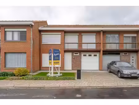 maison avec 4 chambres  jardin orienté sud et garage  situé