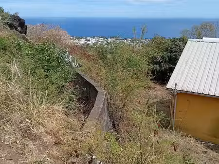 terrain constructible – crève-cœur saint-paul – vue mer – 217 m² – 140 000