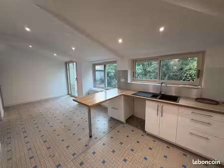 maison 5 pièces de 104 m² avec jardin et garage