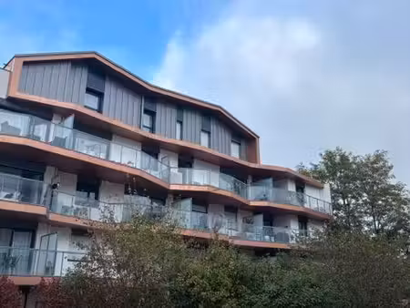 t3 de 58 m² avec terrasse  box et parking  résidence récente  décines