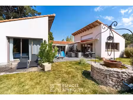 maison 'pile : longère champêtre'  face : contemporaine graphique'