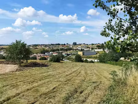 terrain au coeur du village