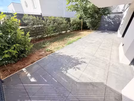 rez-de-jardin / 3p recent 72 m²/ 2 parkings