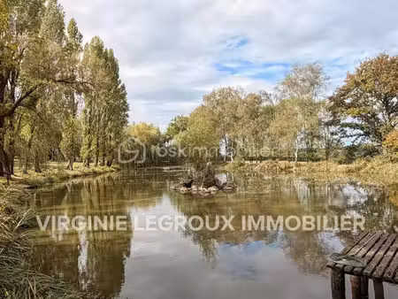 en exclusivité  terrain de loisirs de 8900m2