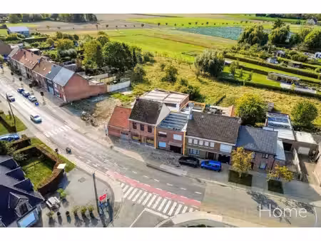 instapklare woning met 2 slpk  garage en zw-gerichte tuin