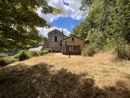 sylvanès  vente maison avec jardin et garage.