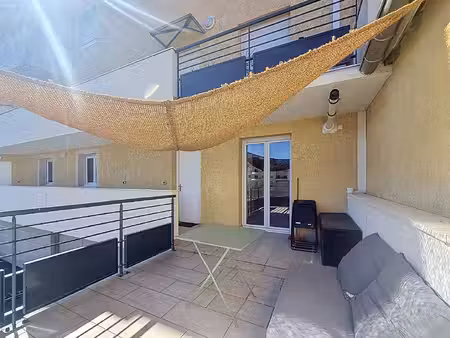 bel appartement centre meximieux 2 pièce(s) 56.45 m2 avec terrasse et balcon et stationnem