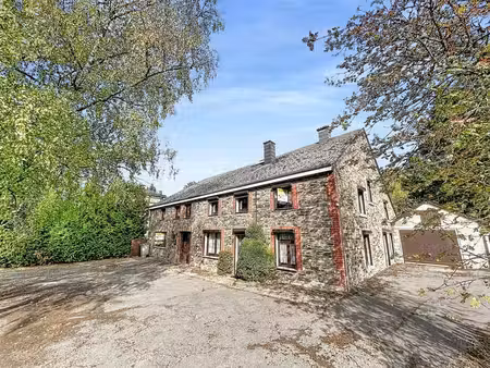 double maison à rénover au coeur de lesse