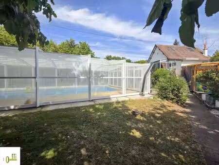 maison avec piscine couverte et chauffée