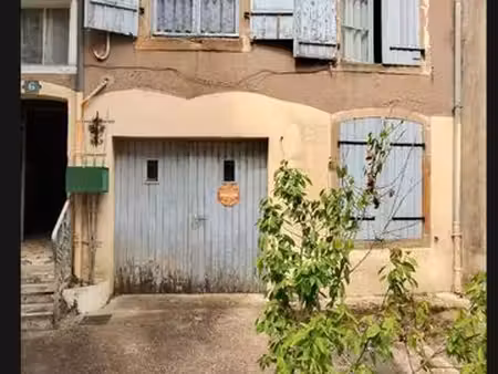 a saisir maison à garage et jardin
