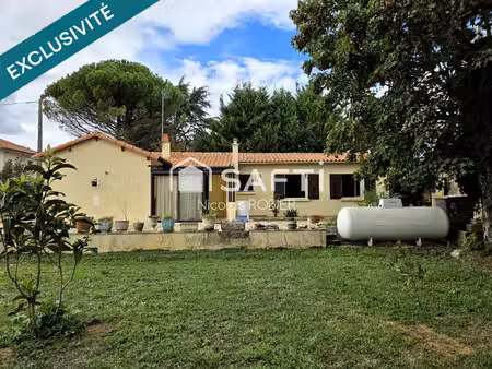 plain pied plus parcelle constructible à deux pas des commodités!