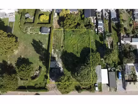unieke grond voor 2 halfopen woningen in wijgmaal