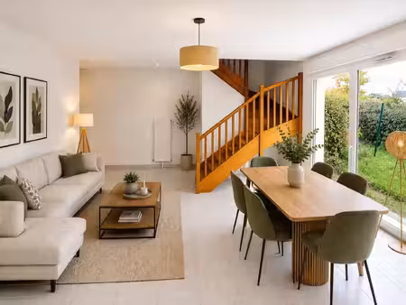 duplex en rez-de-jardin  2 chambres  65 m2  parking en sous-sol