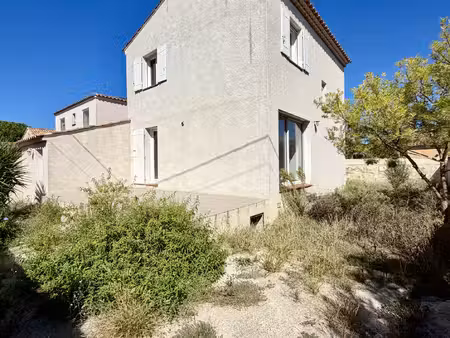 à vendre maison familiale avec jardin et garage au coeur de