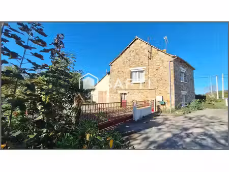 maison à rénover avec dépendances et jardin.