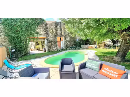 exceptionnel demeure avec piscine chauffée au cœur de puissalicon – idéal famille  investi