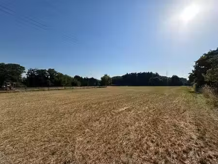 bouwgrond met achterliggende weide te koop