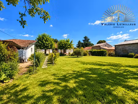 maison individuelle et terrain constructible centre-bourg de
