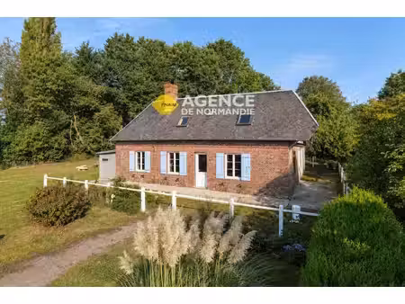 maison en briques avec 2452 m² de terrain secteur broglie