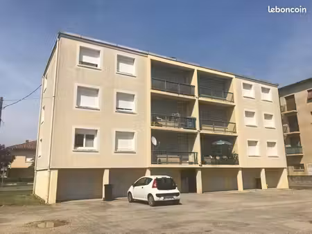 immeuble composé de 6 appartements et 6 garages