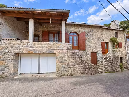 exclusivité mayres  maison mitoyenne en pierre de 136 m² avec terrasses et terrain de 2850