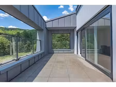 magifique penthouse avec terrasse  2 chambres et parkings!