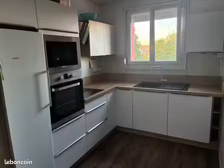 appartement 82 m² – 2 chambres – parking + cave – très bon état