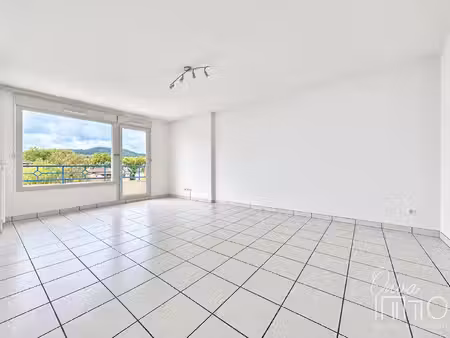 neuville centre - lumineux t2 de 53m² avec balcon et garage