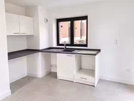 t3 en duplex avec parking et jardin à st andre lez lille